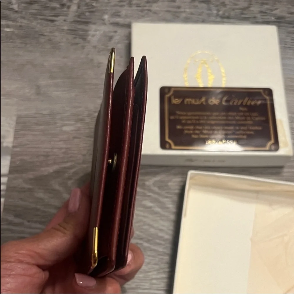 Cartier Burgundy Leather Wallet with Gold Accents